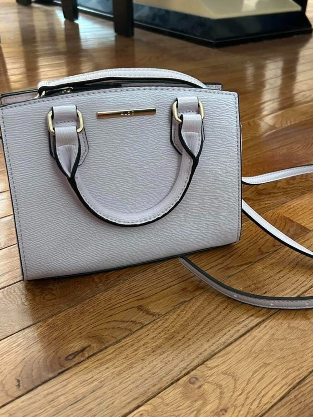Aldo light purple handbag with textured surface and strap